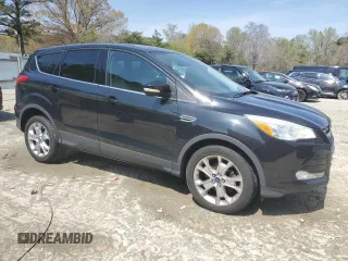 2013 Ford Escape SEL with VIN 1FMCU0HX4DUC48961, listed as a Copart auction lot 52630795 with 179,786 mi miles and Salvage Title. Bid and sale history available at DreamBid. Image 4.