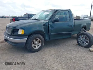 2001 Ford F-150 XL with VIN 1FTZX17221NB70154, listed as a IAAI auction lot 42410776 with 173,864 mi miles and . Bid and sale history available at DreamBid. Image 2.