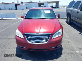 2014 Chrysler 200 Touring with VIN 1C3CCBBB7EN128927, listed as a IAAI auction lot 42313892 with 154,261 mi miles and . Bid and sale history available at DreamBid. Image 6.