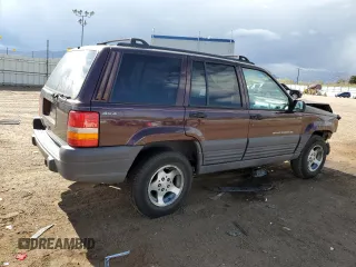 1997 Jeep Grand Cherokee Laredo with VIN 1J4GZ58S1VC747713, listed as a Copart auction lot 55290275 with 159,846 mi miles and Salvage title. Bid and sale history available at DreamBid. Image 3.