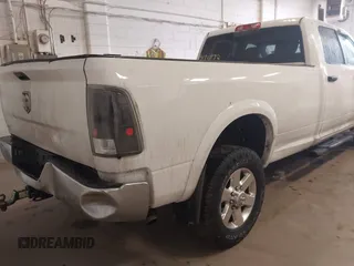 2015 Ram 2500 SLT z VIN 3C6TR5JT2FG645527, wystawiony jako IAAI lot #41711532 z przebiegiem 178 185 mil mil oraz . Historia ofert i sprzedaży dostępna na DreamBid. Obrazek 4.