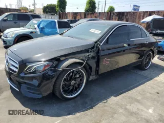 2018 Mercedes-Benz E 300 with VIN WDDZF4JB1JA309572, listed as a Copart auction lot 60334635 with 31,888 mi miles and Salvage title. Bid and sale history available at DreamBid. Image 1.
