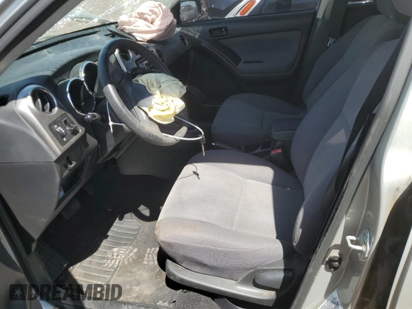 2003 Toyota Matrix Std with VIN 2T1KR32E13C034693, listed as a Copart auction lot 55456735 with 109,958 mi miles and Salvage Title. Bid and sale history available at DreamBid. Image 7.