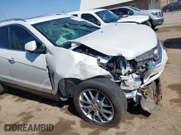 2014 Cadillac SRX Performance Collection with VIN 3GYFNCE38ES675508, listed as a IAAI auction lot 41969292 with 147,534 mi miles and . Bid and sale history available at DreamBid. Image 6.