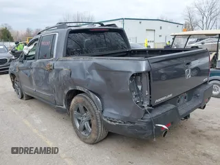 2023 Honda Ridgeline RTL z VIN 5FPYK3F58PB014460, wystawiony jako IAAI lot #41875307 z przebiegiem 77 565 mil mil oraz . Historia ofert i sprzedaży dostępna na DreamBid. Obrazek 3.