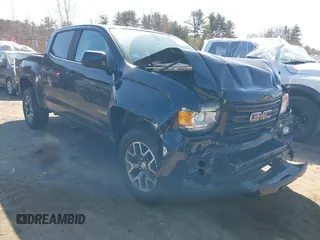 2018 GMC Canyon 4WD SLE z VIN 1GTG6CEN3J1232123, wystawiony jako IAAI lot #41794667 z przebiegiem 72 677 mil mil oraz . Historia ofert i sprzedaży dostępna na DreamBid. Obrazek 1.