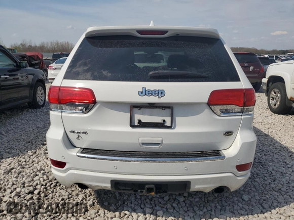 2020 Jeep Grand Cherokee Overland with VIN 1C4RJFCG4LC398526, listed as a Copart auction lot 54221205 with 122,046 mi miles and Salvage Title. Bid and sale history available at DreamBid. Image 6.