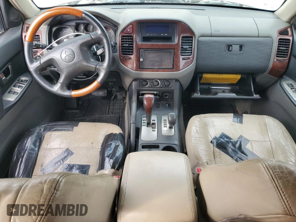 2003 Mitsubishi Montero LTD with VIN JA4NW51S63J019484, listed as a Copart auction lot 86089024 with 0 mi miles and Salvage Title. Bid and sale history available at carsss.com. Image 8.