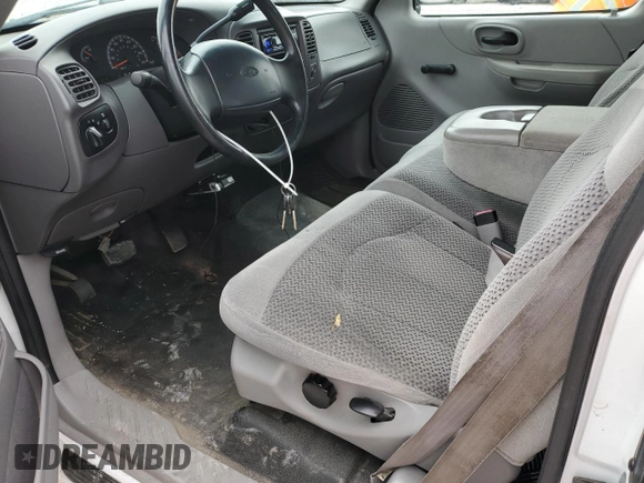 1999 Ford F-150 with VIN 2FTRX17W3XCA68816, listed as a Copart auction lot 53080755 with 201,501 mi miles and Salvage Title. Bid and sale history available at DreamBid. Image 8.