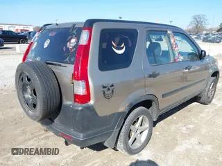 2005 Honda CR-V LX with VIN JHLRD78565C040337, listed as a IAAI auction lot 41959248 with 179,389 mi miles. Bid and sale history available at carsss.com. Image 4.