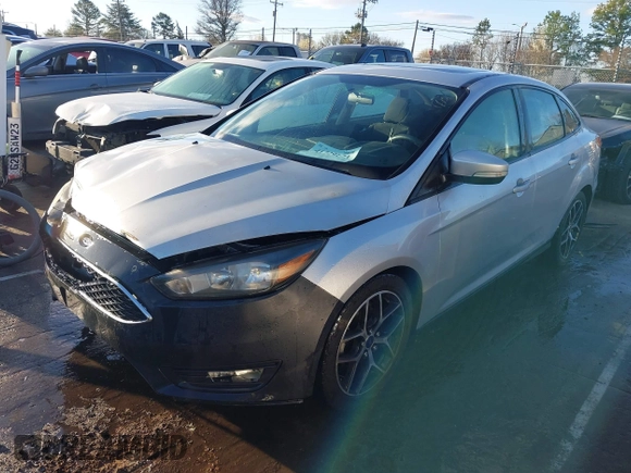 2017 Ford Focus SEL with VIN 1FADP3H21HL336597, listed as a IAAI auction lot 41729173 with 166,140 mi miles. Bid and sale history available at carsss.com. Image 2.