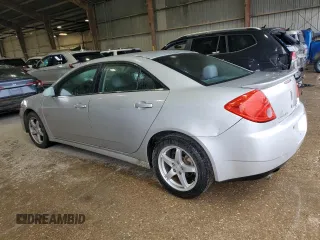 2009 Pontiac G6 GT 1SB z VIN 1G2ZK57K694233980, wystawiony jako Copart lot #54146815 z przebiegiem 96 973 mil mil oraz Szkoda całkowita • Salvage title. Historia ofert i sprzedaży dostępna na DreamBid. Obrazek 2.