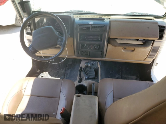 2001 Jeep Wrangler Sahara with VIN 1J4FA59S81P321490, listed as a Copart auction lot 57320005 with 180,959 mi miles and Salvage title. Bid and sale history available at DreamBid. Image 8.