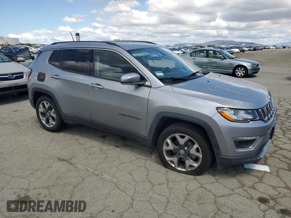 2020 Jeep Compass Limited with VIN 3C4NJCCB3LT128807, listed as a Copart auction lot 56673705 with 94,903 mi miles and Salvage title. Bid and sale history available at DreamBid. Image 4.