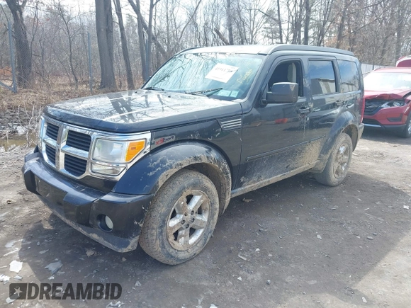2008 Dodge Nitro SXT with VIN 1D8GU28K98W225158, listed as a IAAI auction lot 41911789 with 180,450 mi miles. Bid and sale history available at carsss.com. Image 2.