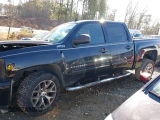 2011 Chevrolet Silverado 1500 LT with VIN 3GCPKSE34BG326812, listed as a IAAI auction lot 41446991 with 149,952 mi miles. Bid and sale history available at carsss.com. Image 14.