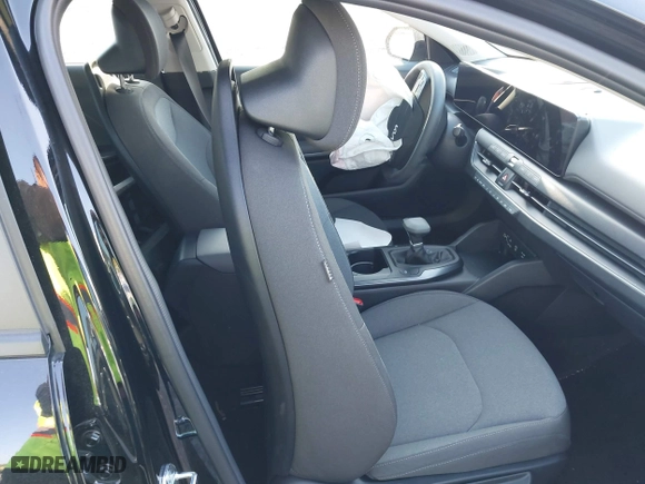 2025 Kia K4 LXS with VIN 3KPFT4DE6SE038213, listed as a IAAI auction lot 42014375 with 4,385 mi miles. Bid and sale history available at carsss.com. Image 5.