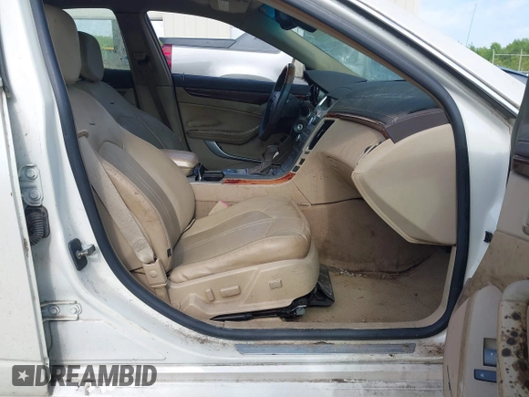 2009 Cadillac CTS RWD with VIN 1G6DF577690108865, listed as a IAAI auction lot 42314121 with 153,702 mi miles and . Bid and sale history available at DreamBid. Image 5.