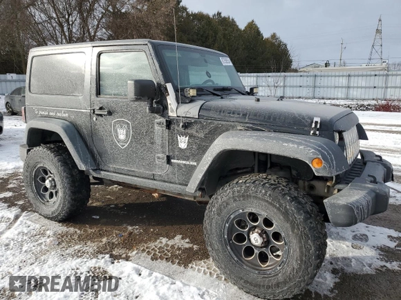 2011 Jeep Wrangler Rubicon with VIN 1J4BA6D1XBL556808, listed as a Copart auction lot 87358534 with 196,139 mi miles and Clean Title. Bid and sale history available at carsss.com. Image 4.