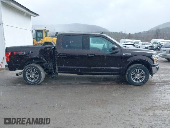 2019 Ford F-150 XL with VIN 1FTFW1E13KFC63843, listed as a IAAI auction lot 41682862 with 102,390 mi miles. Bid and sale history available at carsss.com. Image 14.