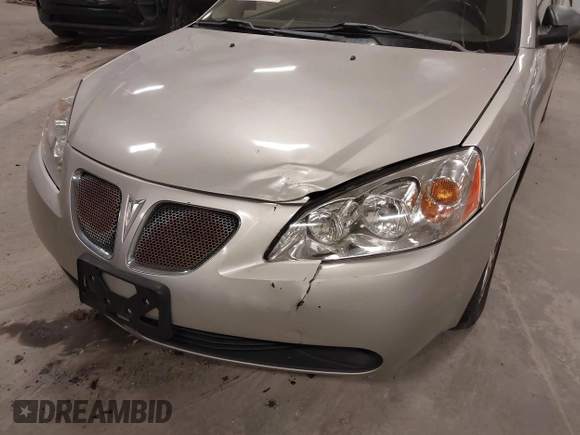 2006 Pontiac G6 1SV z VIN 1G2ZF55B264218234, wystawiony jako IAAI lot #41875165 z przebiegiem 226 618 mil mil oraz . Historia ofert i sprzedaży dostępna na DreamBid. Obrazek 6.