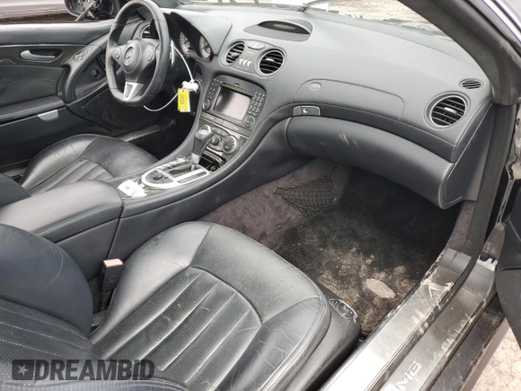 2009 Mercedes-Benz SL 55/63 AMG with VIN WDBSK70F79F157839, listed as a Copart auction lot 52350295 with 79,670 mi miles and Salvage title. Bid and sale history available at DreamBid. Image 8.