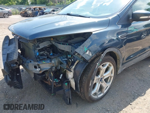 2019 Ford Escape Titanium with VIN 1FMCU9J99KUC00935, listed as a IAAI auction lot 42583250 with 91,241 mi miles and . Bid and sale history available at DreamBid. Image 6.