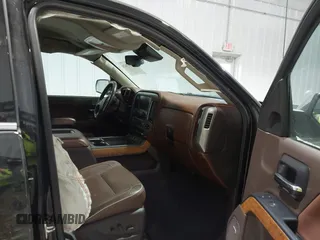 2016 Chevrolet Silverado 1500 High Country with VIN 3GCUKTEC8GG221707, listed as a IAAI auction lot 41587628 with 63,740 mi miles and . Bid and sale history available at DreamBid. Image 5.