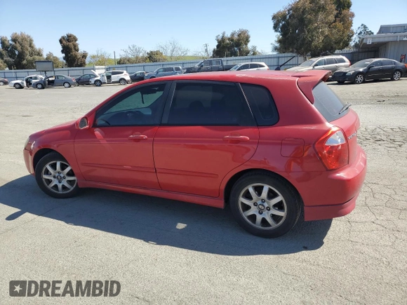 2005 Kia Spectra with VIN KNAFE162455069422, listed as a Copart auction lot 52999455 with 249,774 mi miles and Salvage Title. Bid and sale history available at carsss.com. Image 2.