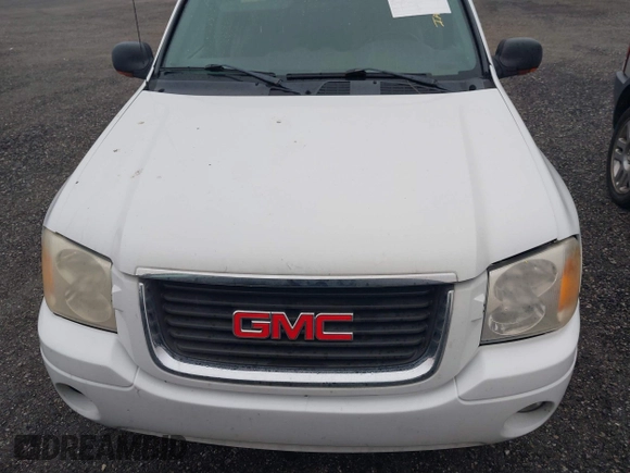 2003 GMC Envoy SLE with VIN 1GKDT13S732332171, listed as a IAAI auction lot 41520620 with 222,373 mi miles. Bid and sale history available at carsss.com. Image 6.