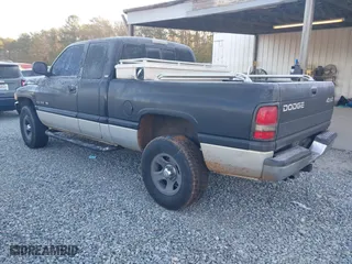 1998 Dodge Ram 1500 with VIN 1B7HF13Z7WJ104411, listed as a IAAI auction lot 41426007 with 147,186 mi miles. Bid and sale history available at carsss.com. Image 3.