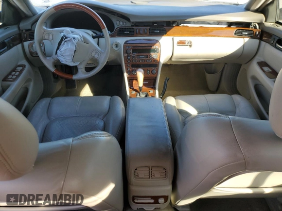 2000 Cadillac Seville Touring STS z VIN 1G6KY5495YU177352, wystawiony jako Copart lot #86020444 z przebiegiem Nie podano mil oraz Szkoda całkowita • Salvage title. Historia ofert i sprzedaży dostępna na DreamBid. Obrazek 8.