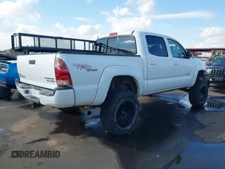 2007 Toyota Tacoma PreRunner z VIN 3TMJU62N87M029323, wystawiony jako IAAI lot #41462575 z przebiegiem 211 104 mil mil oraz . Historia ofert i sprzedaży dostępna na DreamBid. Obrazek 4.