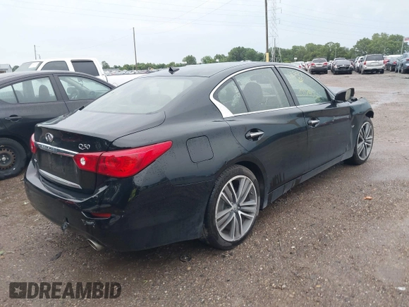 2014 Infiniti Q50 Premium with VIN JN1BV7AR9EM685022, listed as a IAAI auction lot 39874056 with 95,980 mi miles and . Bid and sale history available at DreamBid. Image 4.