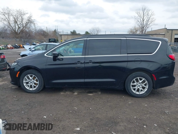 2022 Chrysler Pacifica Touring L with VIN 2C4RC1BG2NR117879, listed as a IAAI auction lot 41845778 with 96,523 mi miles and . Bid and sale history available at DreamBid. Image 14.
