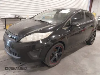 2013 Ford Fiesta SE with VIN 3FADP4EJ5DM195186, listed as a IAAI auction lot 42046227 with 137,794 mi miles. Bid and sale history available at carsss.com. Image 2.
