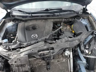2016 Mazda CX-5 Grand Touring z VIN JM3KE4DY2G0637779, wystawiony jako Copart lot #52001805 z przebiegiem 184 381 mil mil oraz Czysty tytuł • Clean title. Historia ofert i sprzedaży dostępna na DreamBid. Obrazek 12.