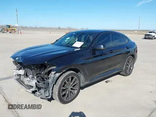 2021 BMW X4 xDrive30i z VIN 5UX2V1C06M9E42747, wystawiony jako IAAI lot #41661458 z przebiegiem 66 292 mil mil oraz . Historia ofert i sprzedaży dostępna na DreamBid. Obrazek 2.