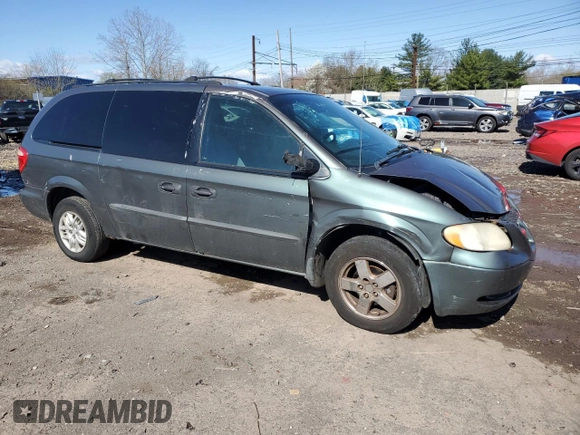 2004 Dodge Caravan SE with VIN 1D4GP24R04B520727, listed as a Copart auction lot 52002475 with 164,954 mi miles and Salvage title. Bid and sale history available at DreamBid. Image 4.