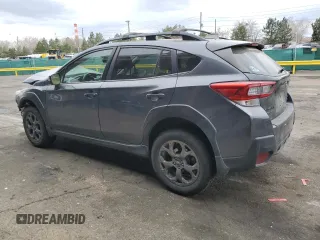 2021 Subaru Crosstrek Sport with VIN JF2GTHRC0MH325385, listed as a Copart auction lot 51017235 with 76,153 mi miles and Salvage Title. Bid and sale history available at carsss.com. Image 2.