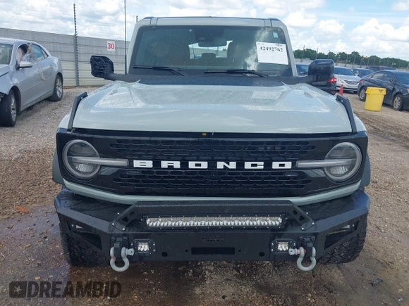 2021 Ford Bronco with VIN 1FMEE5DP6MLA61655, listed as a IAAI auction lot 42492762 with 88,313 mi miles and . Bid and sale history available at DreamBid. Image 12.