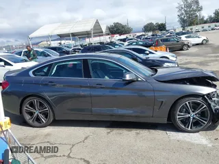 2018 BMW 4 Series 440i with VIN WBA4J5C51JBF07174, listed as a IAAI auction lot 41532904 with 63,745 mi miles and . Bid and sale history available at DreamBid. Image 14.