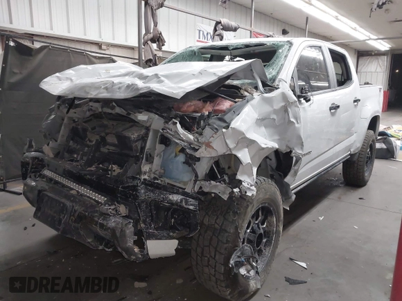 2021 Chevrolet Colorado 4WD Z71 with VIN 1GCGTDENXM1114914, listed as a IAAI auction lot 42096272 with 78,203 mi miles and . Bid and sale history available at DreamBid. Image 2.