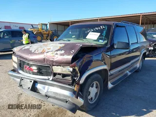 1997 GMC Suburban z VIN 1GKEC16RXVJ703491, wystawiony jako IAAI lot #41219414 z przebiegiem 362 551 mil mil oraz . Historia ofert i sprzedaży dostępna na DreamBid. Obrazek 2.