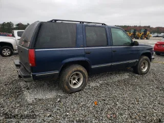 1999 Chevrolet Tahoe with VIN 1GNEC13R3XJ325377, listed as a Copart auction lot 83991974 with 257,816 mi miles and Salvage Title. Bid and sale history available at carsss.com. Image 3.