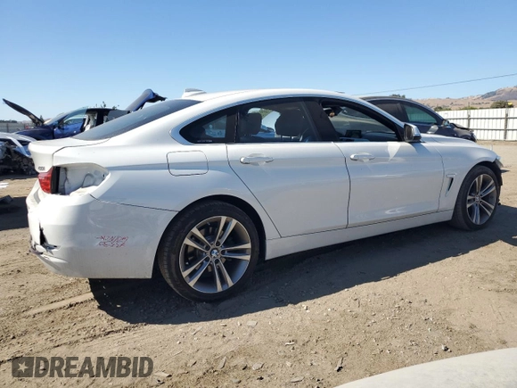 2017 BMW 4 Series 430i xDrive with VIN WBA4F9C33HG813021, listed as a Copart auction lot 63780845 with 69,520 mi miles and Salvage title. Bid and sale history available at DreamBid. Image 3.