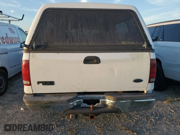 2000 Ford F-350 XL with VIN 1FTSW30S6YEC82315, listed as a Copart auction lot 75479334 with 327,345 mi miles and Salvage Title. Bid and sale history available at DreamBid. Image 6.