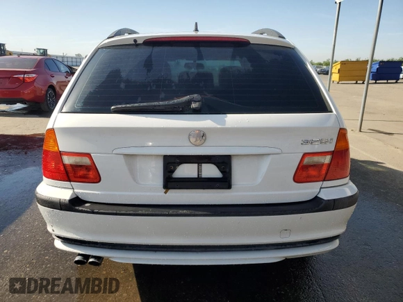 2003 BMW 3 Series 325i with VIN WBAEN33483PC12177, listed as a Copart auction lot 54206945 with 125,512 mi miles and Salvage Title. Bid and sale history available at DreamBid. Image 6.