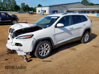 2016 Jeep Cherokee Latitude with VIN 1C4PJLCB8GW125748, listed as a Copart auction lot 60697145 with 118,276 mi miles and Salvage title. Bid and sale history available at DreamBid. Image 1.