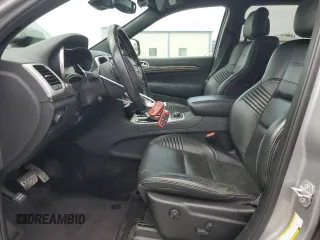 2018 Jeep Grand Cherokee Trackhawk with VIN 1C4RJFN91JC223825, listed as a Copart auction lot 58011465 with 83,177 mi miles and Salvage title. Bid and sale history available at DreamBid. Image 7.